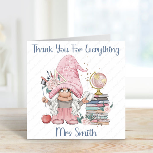 A square card with a pink gnome and a pile of books