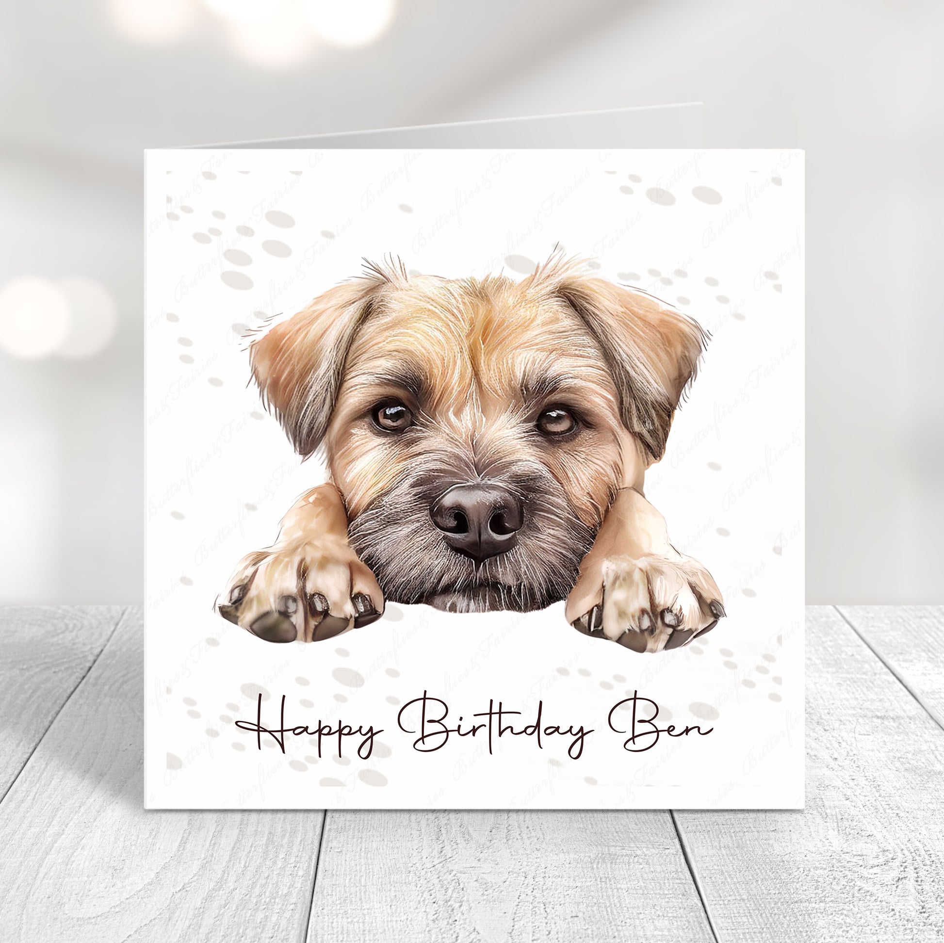 Personalised dog birthday card featuring a cute realistic border terrier dog illustration and “Happy Birthday Name"