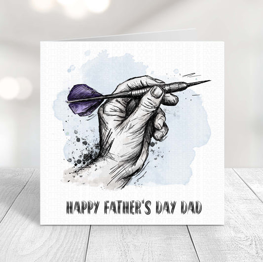 Darts Father’s Day card featuring a hand holding a dart with PURPLE flights, perfect for dad who loves darts